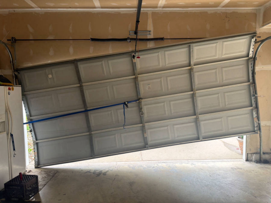 Before — Off-Track Door Repair in Saint Peters, MO